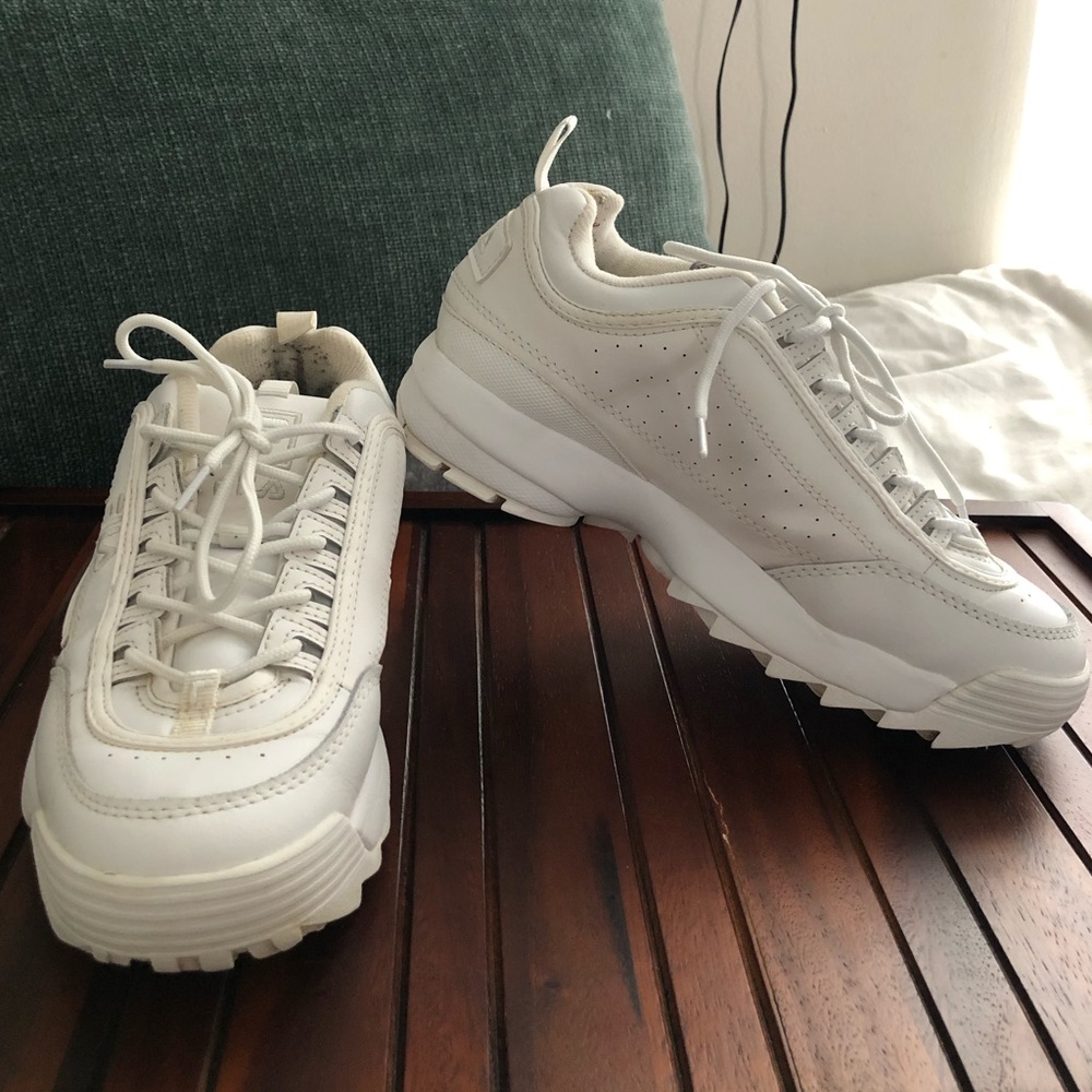 All white Fila platform shoes